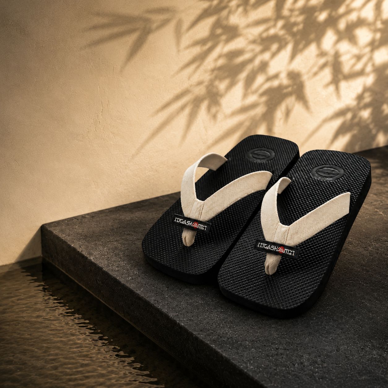 Ink colourway — Ink Black sole, Ivory strap